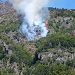 Incendio forestal en Villa Mañihuales moviliza brigadas y helicópteros de CONAF